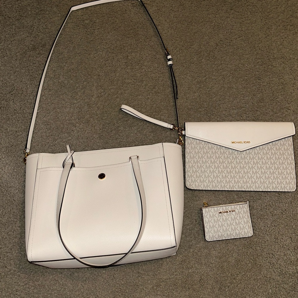 4 piece Michael Kors purse set.  New
